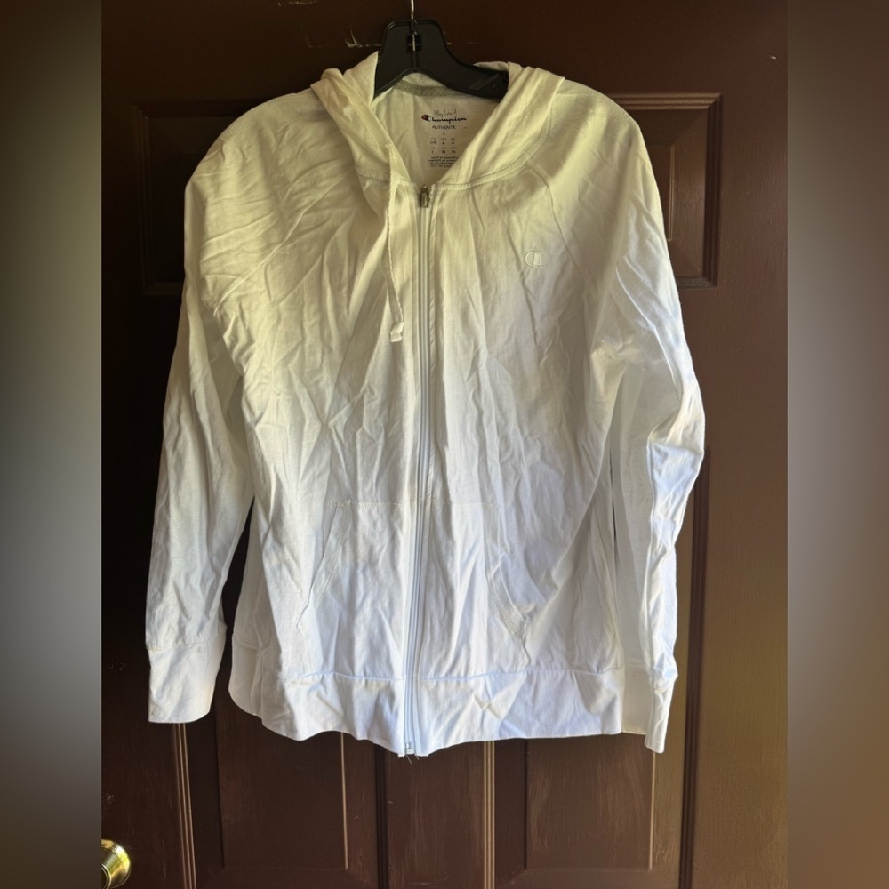 Champion White Zip Up Hoodie Size Large
There is a small stain on the sleeve